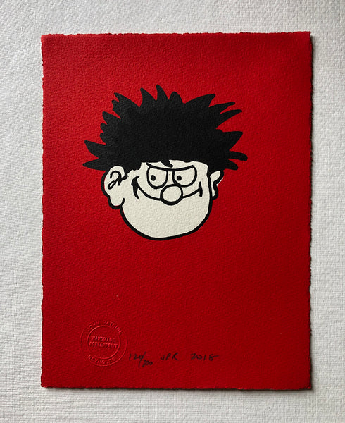 Dennis Menace's Face On Red Background