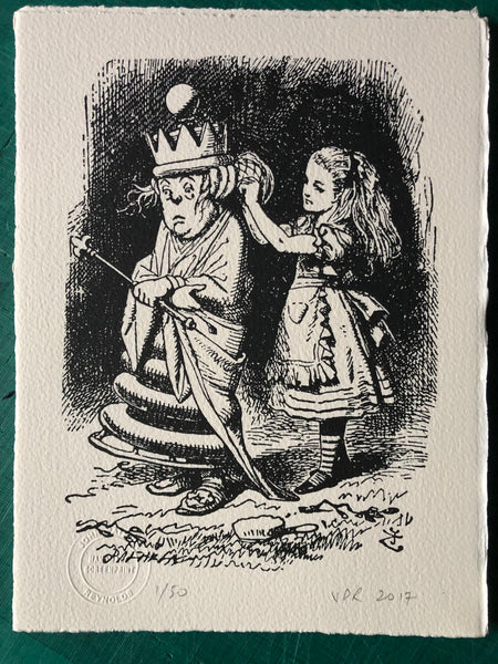 Alice tends to the White Queen.