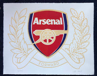 The Arsenal FC crest - with four colours. There are two shades of red on the shield, to give it a three-dimensional feel.
