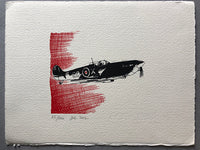 A Spitfire flies out of the clouds