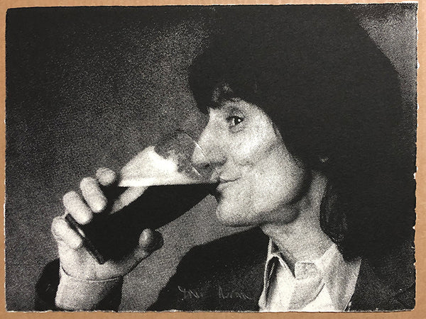 Ronnie Woods drinking Guinness - signed by the snapper Dave Hogan