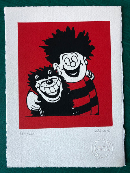 Dennis the Menace and Gnasher take delight in each other