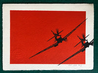A pair of Spitfires bank in perfect unison
